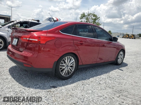 2016 Ford Focus Titanium with VIN 1FADP3J29GL274147, listed as a Copart auction lot 61377575 with 88,181 mi miles and Salvage title. Bid and sale history available at DreamBid. Image 3.