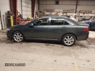 2005 Acura TSX with VIN JH4CL96975C034682, listed as a IAAI auction lot 41596405 with 228,889 mi miles and . Bid and sale history available at DreamBid. Image 14.
