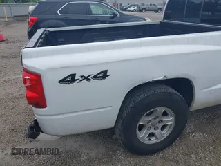 2005 Dodge Dakota SLT with VIN 1D7HW42N75S213191, listed as a IAAI auction lot 42345554 with 152,833 mi miles and . Bid and sale history available at DreamBid. Image 13.