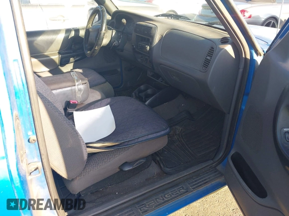 1999 Ford Ranger XLT z VIN 1FTYR14X3XPB39658, wystawiony jako IAAI lot #42762038 z przebiegiem 241 587 mil mil oraz . Historia ofert i sprzedaży dostępna na DreamBid. Obrazek 5.