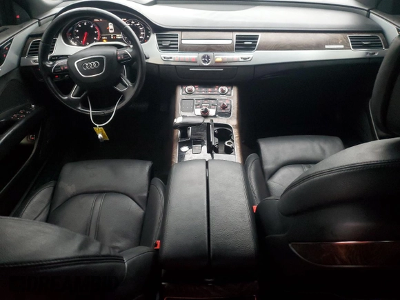2015 Audi A8 z VIN WAUJGAFD0FN010021, wystawiony jako Copart lot #86861684 z przebiegiem 112 697 mil mil oraz Szkoda całkowita • Salvage title. Historia ofert i sprzedaży dostępna na DreamBid. Obrazek 8.