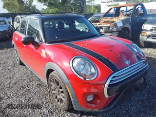 2015 MINI Hardtop 4 Door with VIN WMWXS5C57F2C63418, listed as a IAAI auction lot 41938785 with 101,712 mi miles and . Bid and sale history available at DreamBid. Image 1.