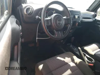 2012 Jeep Wrangler Sport z VIN 1C4AJWAG2CL245174, wystawiony jako Copart lot #63161425 z przebiegiem 136 626 mil mil oraz Czysty tytuł • Clean title. Historia ofert i sprzedaży dostępna na DreamBid. Obrazek 8.