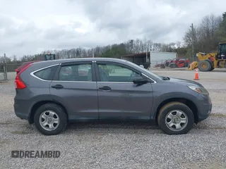 2015 Honda CR-V LX with VIN 2HKRM4H33FH617583, listed as a IAAI auction lot 41805272 with 88,214 mi miles and . Bid and sale history available at DreamBid. Image 14.