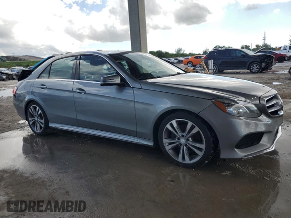 2014 Mercedes-Benz E 350 Sport with VIN WDDHF5KB7EA823075, listed as a Copart auction lot 56886345 with 122,892 mi miles and Salvage title. Bid and sale history available at DreamBid. Image 4.