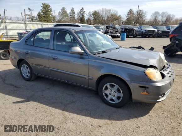 2005 Hyundai Accent GLS with VIN KMHCG45C65U625887, listed as a Copart auction lot 48824225 with 110,594 mi miles and Salvage Title. Bid and sale history available at carsss.com. Image 4.
