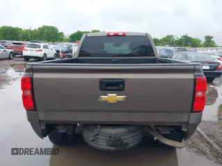 2014 Chevrolet Silverado 1500 LTZ with VIN 1GCVKSEC5EZ249444, listed as a IAAI auction lot 41904569 with 123,650 mi miles and . Bid and sale history available at DreamBid. Image 17.