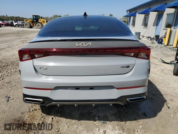2022 Kia K5 GT-Line z VIN 5XXG64J22NG118478, wystawiony jako Copart lot #50174435 z przebiegiem 87 658 mil mil oraz Szkody całkowita. Historia ofert i sprzedaży dostępna na DreamBid. Obrazek 6.