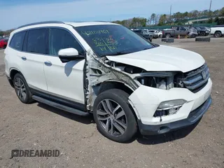 2018 Honda Pilot Touring z VIN 5FNYF6H9XJB053539, wystawiony jako IAAI lot #42104969 z przebiegiem 83 310 mil mil oraz . Historia ofert i sprzedaży dostępna na DreamBid. Obrazek 1.