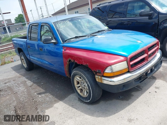 2001 Dodge Dakota Sport z VIN 1B7GL2AN31S115001, wystawiony jako IAAI lot #42452634 z przebiegiem Nie podano mil oraz . Historia ofert i sprzedaży dostępna na DreamBid. Obrazek 1.