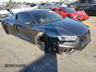 2017 Audi R8 z VIN WUAKBAFX6H7903367, wystawiony jako Copart lot #83113234 z przebiegiem 14 352 mil mil oraz Szkody całkowita. Historia ofert i sprzedaży dostępna na DreamBid. Obrazek 4.