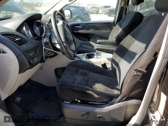 2014 Dodge Grand Caravan SXT z VIN 2C4RDGCG0ER321403, wystawiony jako Copart lot #55204635 z przebiegiem 219 510 mil mil oraz Tytuł czysty. Historia ofert i sprzedaży dostępna na DreamBid. Obrazek 7.