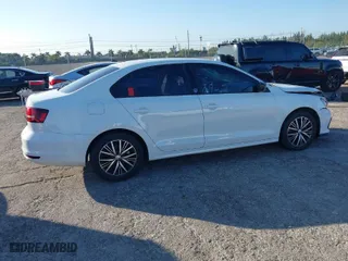 2018 Volkswagen Jetta 1.4T SE with VIN 3VWDB7AJXJM225016, listed as a IAAI auction lot 41309884 with 57,773 mi miles. Bid and sale history available at carsss.com. Image 4.