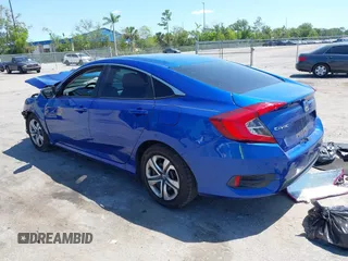 2018 Honda Civic LX with VIN 19XFC2F54JE027744, listed as a IAAI auction lot 42038398 with 119,250 mi miles and . Bid and sale history available at DreamBid. Image 3.