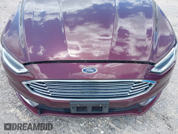 2018 Ford Fusion Titanium with VIN 3FA6P0K92JR114283, listed as a IAAI auction lot 42704476 with 92,502 mi miles and . Bid and sale history available at DreamBid. Image 6.