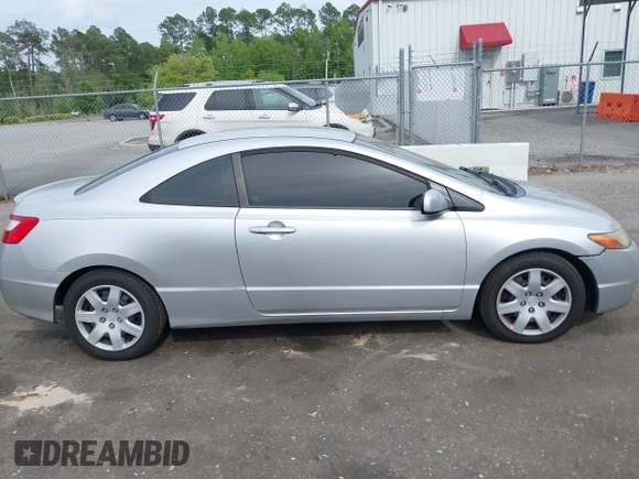 2007 Honda Civic Cpe LX with VIN 2HGFG12667H577166, listed as a IAAI auction lot 41983064 with 98,553 mi miles. Bid and sale history available at carsss.com. Image 13.