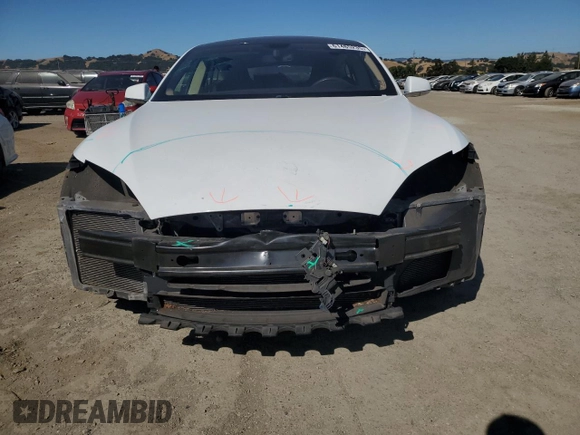 2013 Tesla Model S with VIN 5YJSA1AC7DFP10881, listed as a Copart auction lot 61485235 with 107,032 mi miles and Salvage title. Bid and sale history available at DreamBid. Image 5.