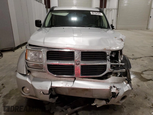 2011 Dodge Nitro SE z VIN 1D4PU2GK4BW506939, wystawiony jako Copart lot #80784344 z przebiegiem 194 357 mil mil oraz Szkoda całkowita • Salvage title. Historia ofert i sprzedaży dostępna na DreamBid. Obrazek 5.