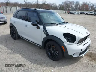 2015 MINI Countryman S z VIN WMWZC3C55FWT04158, wystawiony jako IAAI lot #41846774 z przebiegiem 115 482 mil mil oraz . Historia ofert i sprzedaży dostępna na DreamBid. Obrazek 1.