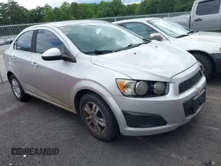 2012 Chevrolet Sonic LT with VIN 1G1JC5SH1C4180400, listed as a IAAI auction lot 42256431 with 188,681 mi miles and . Bid and sale history available at DreamBid. Image 1.