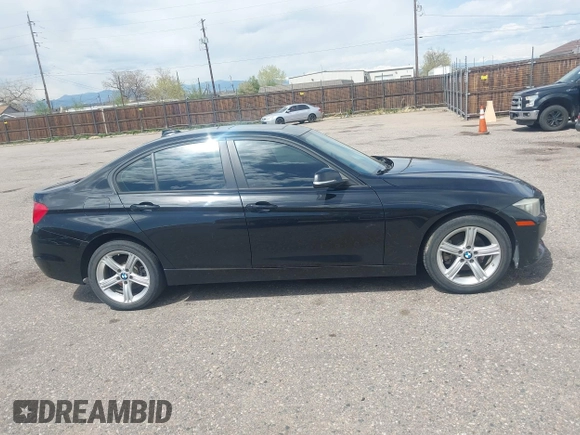 2014 BMW 3 Series 328i xDrive with VIN WBA3B3C56EJ981322, listed as a IAAI auction lot 42104530 with 104,376 mi miles. Bid and sale history available at carsss.com. Image 13.