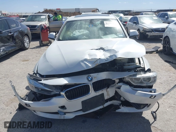 2014 BMW 3 Series 328i xDrive with VIN WBA3B3G51ENR81859, listed as a IAAI auction lot 41828729 with 129,498 mi miles. Bid and sale history available at carsss.com. Image 12.