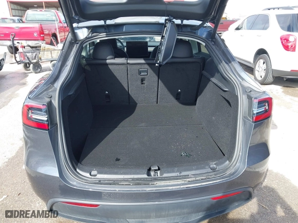 2023 Tesla Model Y Long Range with VIN 7SAYGDEE3PA204992, listed as a IAAI auction lot 41849104 with 22,490 mi miles. Bid and sale history available at carsss.com. Image 19.