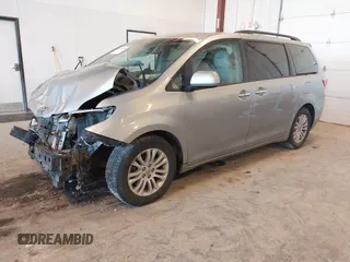 2015 Toyota Sienna XLE with VIN 5TDYK3DCXFS534633, listed as a IAAI auction lot 42018593 with 128,421 mi miles. Bid and sale history available at carsss.com. Image 17.