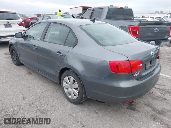 2014 Volkswagen Jetta SE z VIN 3VWD17AJ3EM225383, wystawiony jako IAAI lot #42172006 z przebiegiem 129 198 mil mil oraz . Historia ofert i sprzedaży dostępna na DreamBid. Obrazek 3.