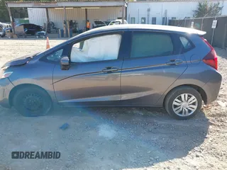 2017 Honda Fit LX with VIN JHMGK5H58HS022560, listed as a IAAI auction lot 40710663 with 86,228 mi miles and . Bid and sale history available at DreamBid. Image 14.