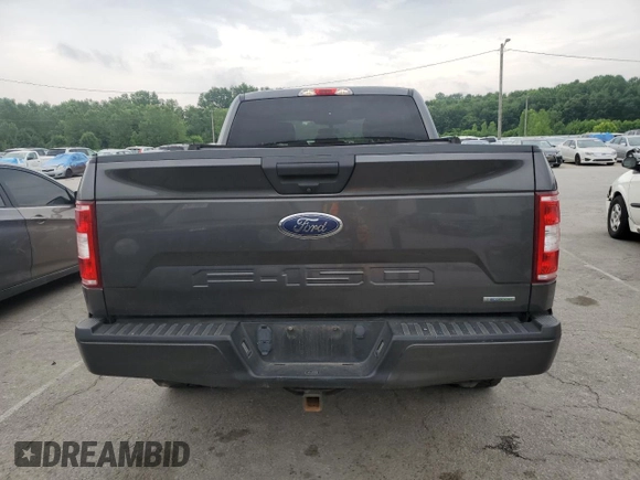 2019 Ford F-150 XL with VIN 1FTEX1EP9KKC47098, listed as a Copart auction lot 60653275 with 104,823 mi miles and Salvage title. Bid and sale history available at DreamBid. Image 6.