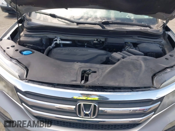 2016 Honda Pilot LX with VIN 5FNYF5H10GB044006, listed as a IAAI auction lot 42075404 with 129,642 mi miles and . Bid and sale history available at DreamBid. Image 10.