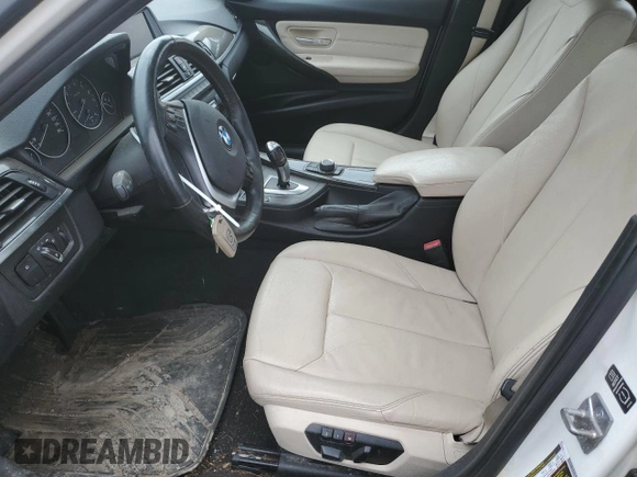 2013 BMW 3 Series 320i xDrive with VIN WBA3C3C59DF981328, listed as a Copart auction lot 57132395 with 152,458 mi miles and Salvage title. Bid and sale history available at DreamBid. Image 7.