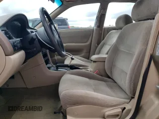 1998 Mazda 626 DX with VIN 1YVGF22CXW5733338, listed as a Copart auction lot 71796184 with 196,218 mi miles and Salvage Title. Bid and sale history available at carsss.com. Image 7.