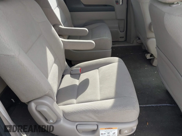 2014 Honda Odyssey LX with VIN 5FNRL5H24EB001551, listed as a IAAI auction lot 41879040 with 119,200 mi miles and . Bid and sale history available at DreamBid. Image 8.