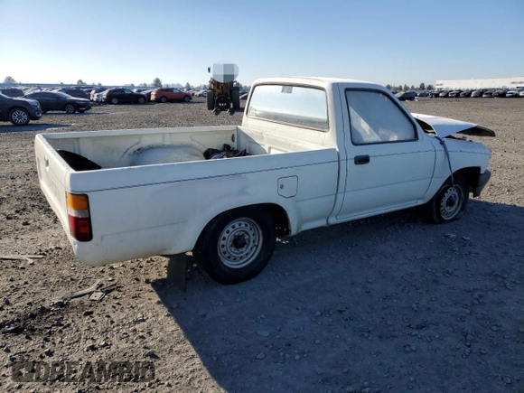 1990 Toyota Pickup with VIN JT4RN81R1L0049863, listed as a Copart auction lot 42832405 with 230,913 mi miles and Salvage title. Bid and sale history available at DreamBid. Image 3.