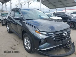 2023 Hyundai Tucson SEL z VIN 5NMJBCAE2PH289192, wystawiony jako IAAI lot #42137633 z przebiegiem 25 780 mil mil oraz . Historia ofert i sprzedaży dostępna na DreamBid. Obrazek 1.
