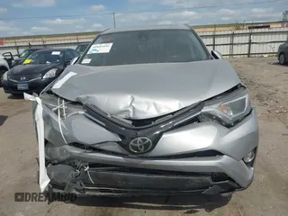 2018 Toyota RAV4 XLE z VIN 2T3WFREV5JW466294, wystawiony jako IAAI lot #41841436 z przebiegiem 132 150 mil mil oraz . Historia ofert i sprzedaży dostępna na DreamBid. Obrazek 12.