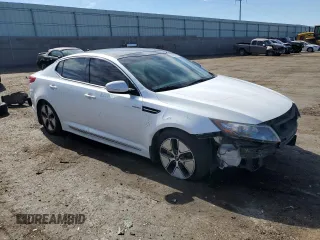 2013 Kia Optima Hybrid EX with VIN KNAGM4ADXD5060028, listed as a Copart auction lot 69083304 with 119,701 mi miles and Salvage Title. Bid and sale history available at carsss.com. Image 4.