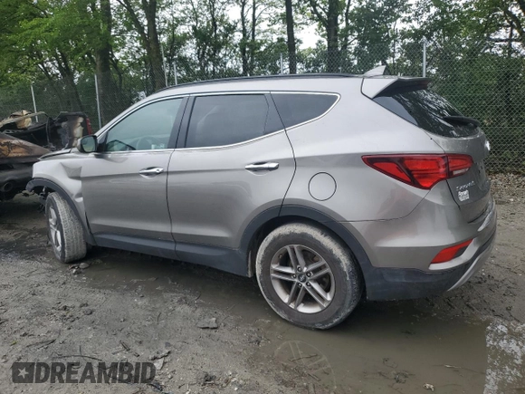 2017 Hyundai Santa Fe 2.4L z VIN 5NMZU3LB8HH032409, wystawiony jako Copart lot #57939915 z przebiegiem 105 494 mil mil oraz Szkoda całkowita • Salvage title. Historia ofert i sprzedaży dostępna na DreamBid. Obrazek 2.