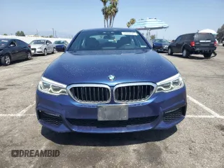 2018 BMW 5 Series 540i with VIN WBAJE5C51JWA94673, listed as a Copart auction lot 59807825 with 77,051 mi miles and Salvage title. Bid and sale history available at DreamBid. Image 5.