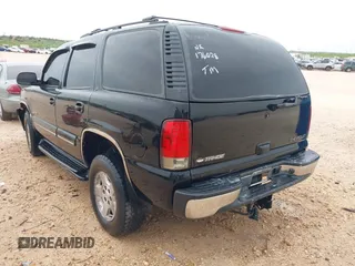 2002 Chevrolet Tahoe LT with VIN 1GNEC13Z72R176028, listed as a IAAI auction lot 41897050 with 216,553 mi miles. Bid and sale history available at carsss.com. Image 3.