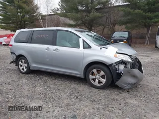 2012 Toyota Sienna with VIN 5TDKA3DC7CS015592, listed as a IAAI auction lot 40839775 with 161,944 mi miles and . Bid and sale history available at DreamBid. Image 1.
