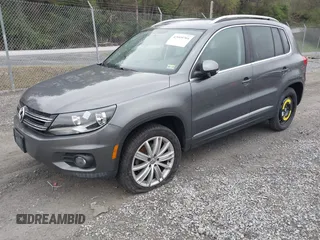 2013 Volkswagen Tiguan SE with VIN WVGAV7AX9DW547633, listed as a IAAI auction lot 42009704 with 51,826 mi miles and . Bid and sale history available at DreamBid. Image 2.