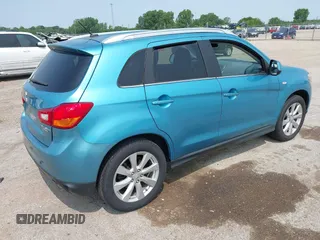 2014 Mitsubishi Outlander SE z VIN 4A4AR4AU2EE026685, wystawiony jako IAAI lot #42481070 z przebiegiem 136 279 mil mil oraz . Historia ofert i sprzedaży dostępna na DreamBid. Obrazek 4.