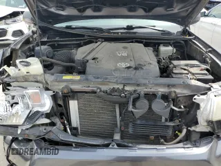 2013 Toyota Tacoma z VIN 5TFUU4EN5DX058037, wystawiony jako Copart lot #58387535 z przebiegiem 110 564 mil mil oraz Szkoda całkowita • Salvage title. Historia ofert i sprzedaży dostępna na DreamBid. Obrazek 11.