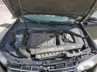 2014 Volkswagen Passat SE z VIN 1VWBN7A35EC066557, wystawiony jako Copart lot #57065545 z przebiegiem 112 154 mil mil oraz Szkoda całkowita • Salvage title. Historia ofert i sprzedaży dostępna na DreamBid. Obrazek 11.