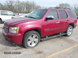 2007 Chevrolet Tahoe LTZ with VIN 1GNFK130X7R319974, listed as a IAAI auction lot 41955206 with 187,445 mi miles and . Bid and sale history available at DreamBid. Image 2.