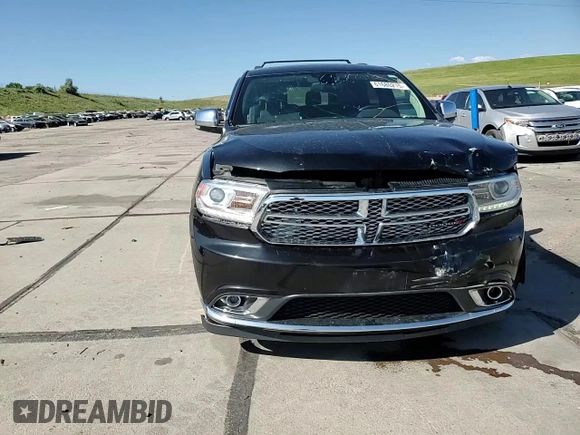 2016 Dodge Durango Citadel with VIN 1C4RDJEG6GC341421, listed as a Copart auction lot 61680215 with 77,024 mi miles and Salvage title. Bid and sale history available at DreamBid. Image 14.