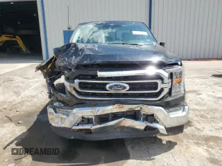 2023 Ford F-150 XL with VIN 1FTFW1E88PFC77984, listed as a Copart auction lot 62222845 with 36,957 mi miles and Salvage title. Bid and sale history available at DreamBid. Image 5.